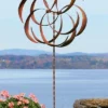 Ancient Graffiti Kinetic Dual Flower Copper Colored 87" Spinner Lawn & Garden